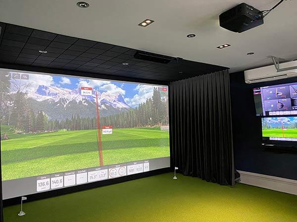 Golf simulator in garage