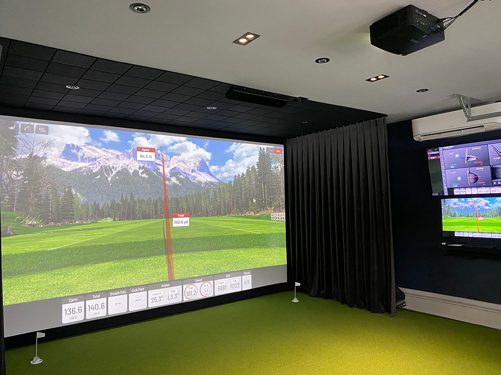 Home golf simulator in garage