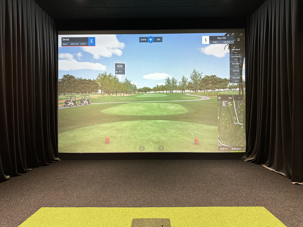 Golf simulator installed in garage